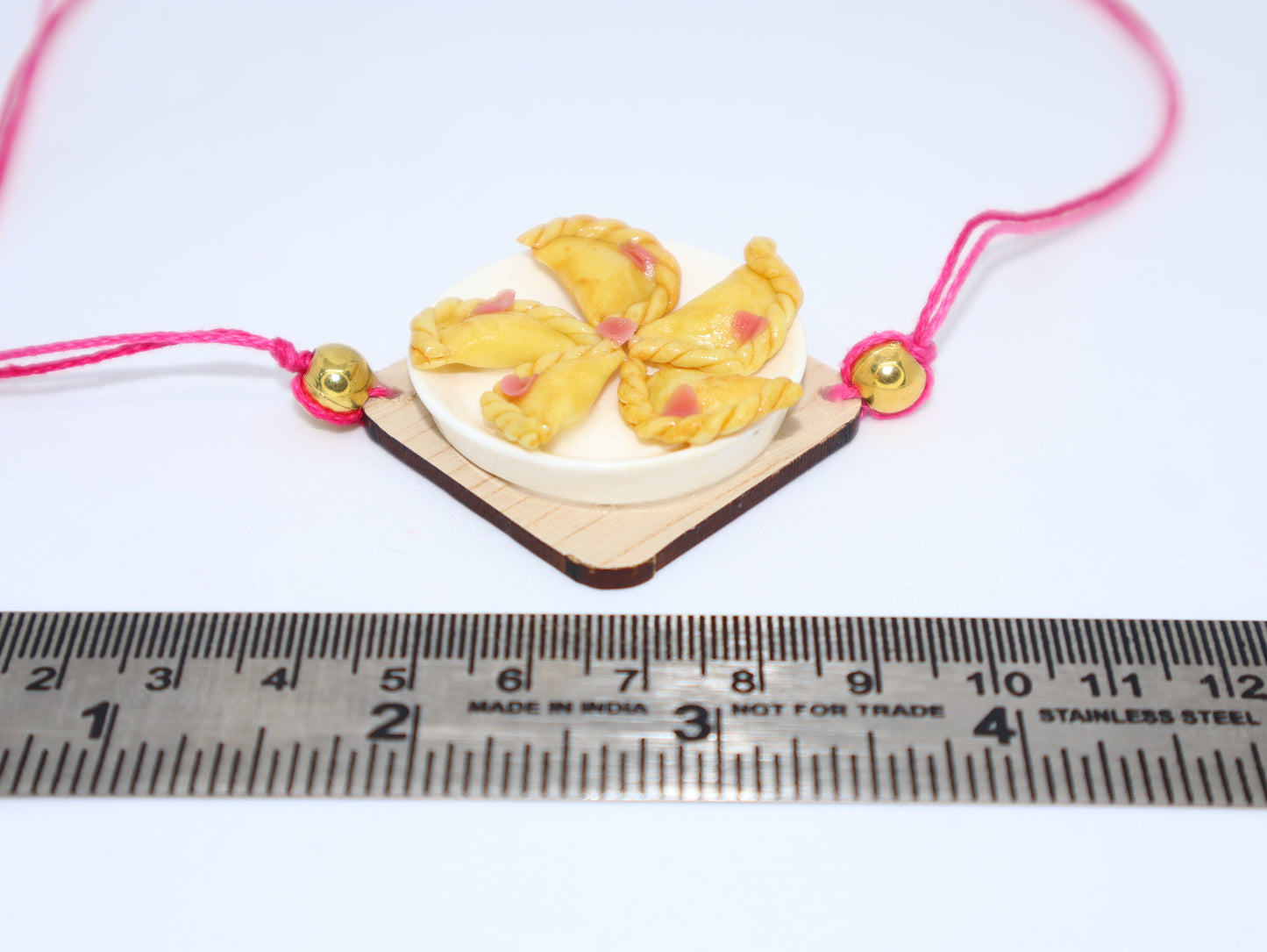 Miniature Gujia Platter Rakhi