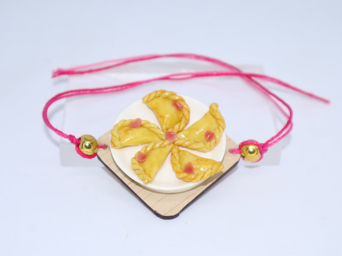 Miniature Gujia Platter Rakhi